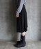 LAYERED PLEATED MIDI SKIRT