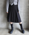 LAYERED PLEATED MIDI SKIRT