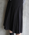 LAYERED PLEATED MIDI SKIRT